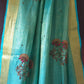 HANDWOVEN SKY BLUE TISSUE LINEN SAREE WITH HAND EMBROIDERY